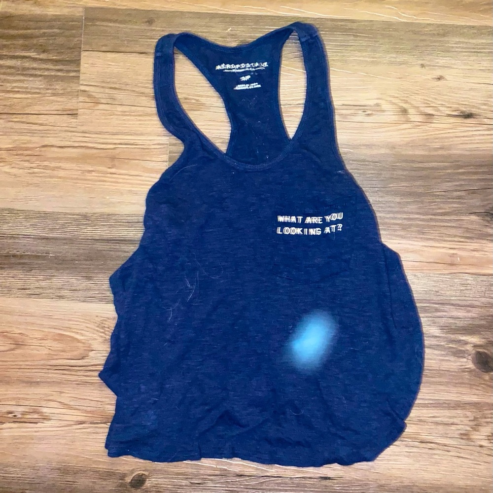Tank/ Intentional cuts on side showing stomach/ Aztec design on back